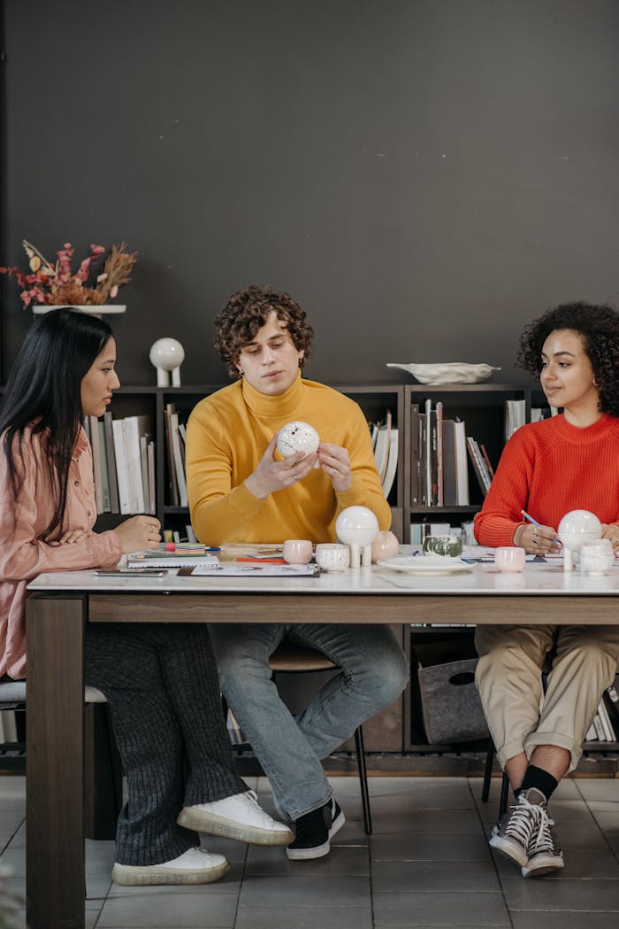 Diverse team collaborating on project ideas in a contemporary office setting.